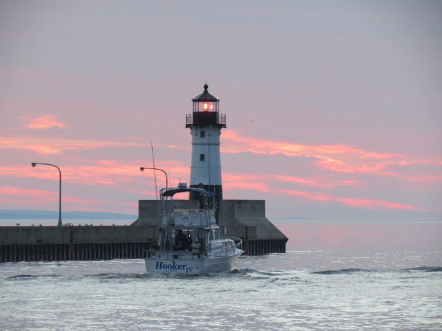 light house and fishing charter on lake sueperior